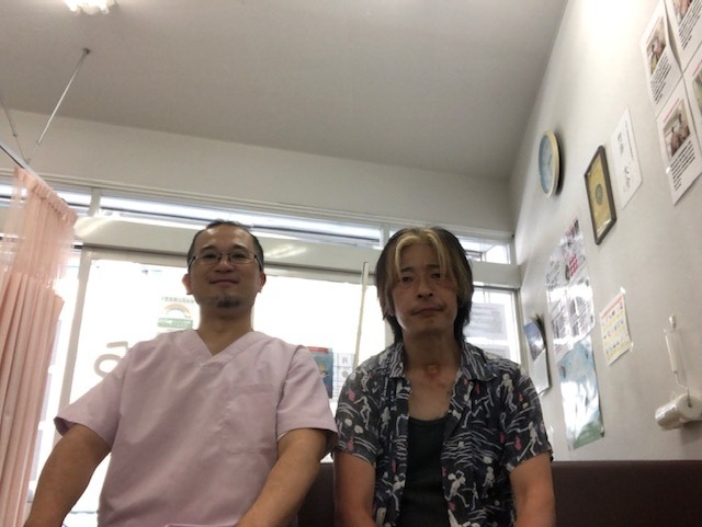 頸椎ヘルニアを施術で改善させた40代男性会社員とのツーショット